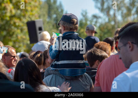 Berlin, Germany. 22nd Sep, 2019. 'Police' is written on the vest of a young visitor at the Berlin Police Open Day. Credit: Paul Zinken/dpa/Alamy Live News Stock Photo