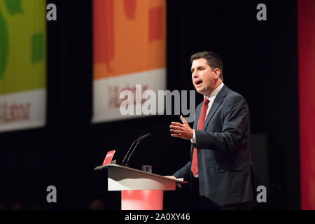 Labour Party Annual Conference 2019, Brighton Centre, Brighton, England, UK. 22nd. September, 2019. Richard Burgon M.P. Shadow Secretary of State for Justice and Shadow Lord Chancellor speaking on the main stage about Rebuilding Public Services at the Labour Party Annual Conference 2019 Credit: Alan Beastall/Alamy Live News. Stock Photo