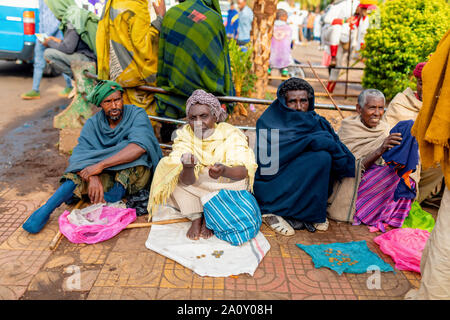 BAHIR DAR, ETHIOPIA, APRIL 21th. 2019, Begging people on the street on Easter holidays. April 21th. 2019, Bahir Dar, Etiopia Stock Photo