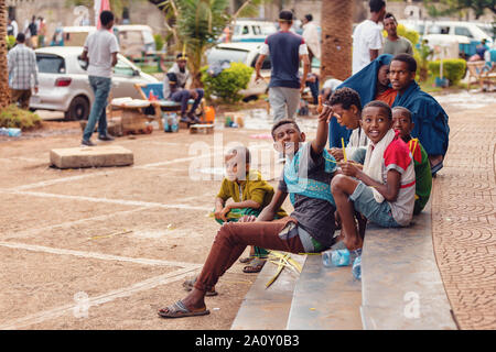 BAHIR DAR, ETHIOPIA, APRIL 21th. 2019, teenager boys on the street of Bahir Dar on Easter holidays. April 21th. 2019, Bahir Dar, Etiopia Stock Photo