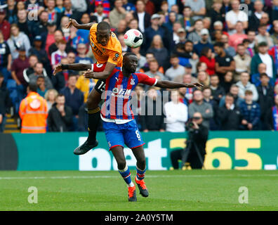 London, UK. 22nd Sep, 2019. L-R Wolverhampton Wanderers' Willy Boly beats Crystal Palace's Christian Benteke during English Premier League between Crystal Palace and Wolverhampton Wanderers at Selhurst Park Stadium, London, England on 22 September 2019 Credit: Action Foto Sport/Alamy Live News