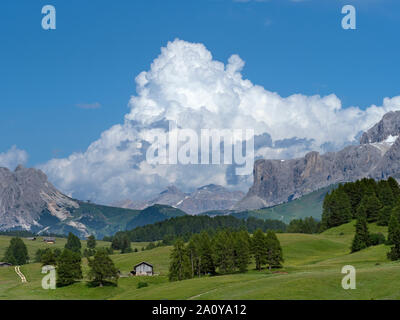 Seiser Alm Dolomites plateau largest Alpine meadow in Europe mountains of Langkofel Group in the background Stock Photo