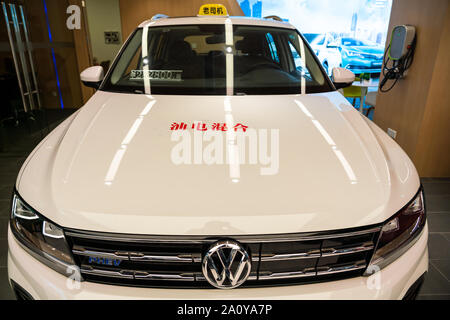 Volkswagen Tiguan PHEV displayed at an electric and hybrid cars retailer in  Shanghai Stock Photo - Alamy