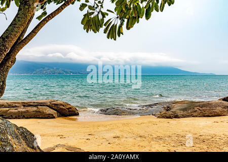 Beach on Ilhabela Island on Sao Paulo's North Coast Overlooking the Continent and the City of Sao Sebastiao Stock Photo