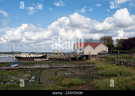 WEST MERSEA, ESSEX, UK - AUGUST 31, 2018:  View along the shore of the River Blackwater Stock Photo