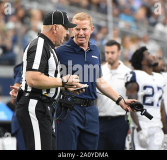 Dallas Cowboys head coach Jason Garrett instructs the team as he ...