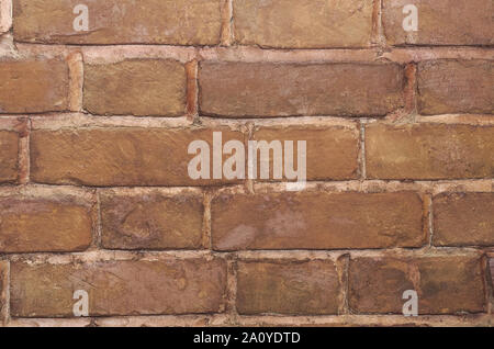The background of the old brick wall, tinted brown Stock Photo