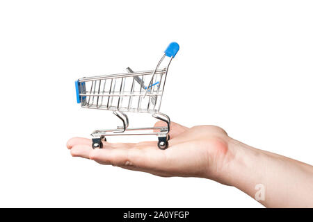 Man hold a shopping cart on the hand, white background Stock Photo