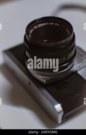 Old vintage Canon SLR camera, Vintage Canon FTB QL 35mm Film SLR Camera W/ FD 50mm F/1.8 Lens Stock Photo