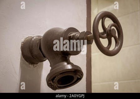 Old vintage antique brass fire water valve Stock Photo