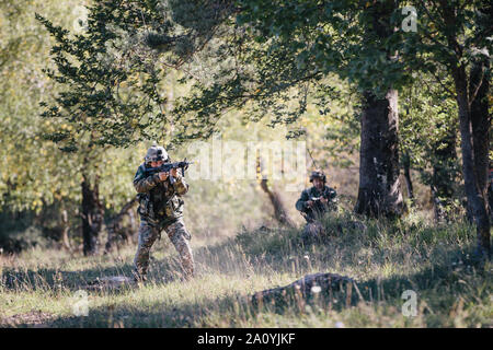 Cavalry Scout soldiers from  North Macedonia react to enemy contact alongside their U.S. counterparts, paratroopers assigned to 1st Squadron, 91st Cavalry Regiment, in Hohenfels Training Area, Germany, during Saber Junction 19 (SJ19), Sept. 22, 2019.    1st Squadron, 91st Cavalry Regiment is the 173rd’s only cavalry battalion, responsible for setting screens and mounting reconnaissance operations. Working alongside their multinational allies not only increases the scope of operations, but exposes both units to new methodologies and technologies within the discipline of reconnaissance.     SJ19 Stock Photo