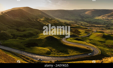 The road leading down to Edale in the Peak district at sunset. Image taken from Mam Tor. Stock Photo