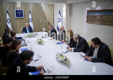 (190922) -- JERUSALEM, Sept. 22, 2019 (Xinhua) -- Israeli President Reuven Rivlin (Rear) meets with members of the Yisrael Beiteinu party at the President's Residence in Jerusalem, on Sept. 22, 2019. Israeli President Reuven Rivlin began on Sunday consultations with all elected parties before he decides the person who will be tasked with forming Israel's next government amid post-election political stalemate. (Yonatan Sindel/JINI via Xinhua) Stock Photo