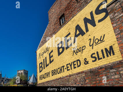 Bile beans advertising sign on side of building in York, UK with york Minster in background. Stock Photo