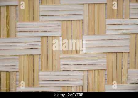 https://l450v.alamy.com/450v/2a0ytrb/woven-bamboo-mat-as-exterior-wall-of-a-house-southeast-asia-2a0ytrb.jpg
