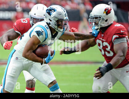 Glendale, USA. 22nd Sep, 2019. Carolina Panthers' DJ Moore (L) gives Arizona Cardinals' Clinton McDonald a straight arm in the second quarter at State Farm Stadium in Glendale, Arizona on Sunday, September 22, 2019. Photo by Art Foxall/UPI Credit: UPI/Alamy Live News Stock Photo