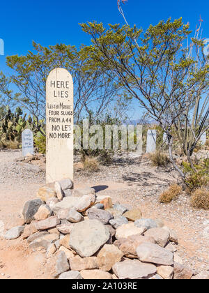Wooden grave stone with the words 'Here lies Lester Moore, four slugs from a 44, no less, no more,' in the Boothill Graveyard in Tombstone, Arizona. Stock Photo