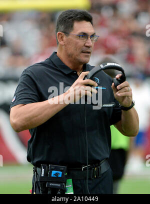 Glendale, USA. 22nd Sep, 2019. Carolina Panthers' head coach Ron Rivera gets set to put on his head set before the start of the Panthers game against the Arizona Cardinals at State Farm Stadium in Glendale, Arizona on Sunday, September 22, 2019. The Panthers defeated the Cardinals 38-20. Photo by Art Foxall/UPI Credit: UPI/Alamy Live News Stock Photo