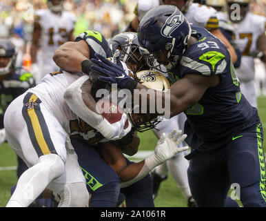 Santa Clara, United States. 12th Nov, 2019. San Francisco 49ers running  back Tevin Coleman (26) is tackled by Seattle Seahawks middle linebacker  Bobby Wagner (54) with an assist by a jersey pull