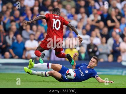 London, UK. 23rd Sep, 2019. Liverpool's Sadio Mane (L) is tackled by Chelsea's Cesar Azpilicueta during the English Premier League match between Chelsea and Liverpool at Stamford Bridge in London, Britain on Sept. 22, 2019. Credit: Xinhua/Alamy Live News Stock Photo