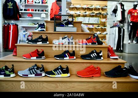 Adidas shoes in flagship store in York USA Stock Photo - Alamy