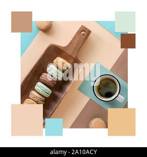 Color matching complementary palette from macarons and expresso, flat lay on geometric paper background in creme, brown and blue mint colors Stock Photo