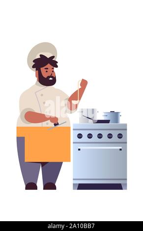 male professional chef cook preparing and tasting dishes african american man restaurant worker in uniform near kitchen stove cooking food concept Stock Vector