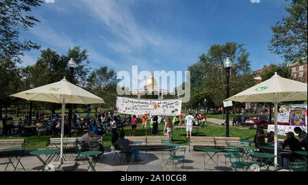 Boston, Massachusetts, USA. 22 September, 2019.  10th  annual United Nations International Day of Peace and Climate Action on the Boston Common.  About 100 people gathered on the Boston Common below the Massachusetts State House in central Boston, MA. Credit Chuck Nacke / Alamy Live News