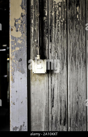 Switch in old and demolished house, construction and architecture Stock Photo