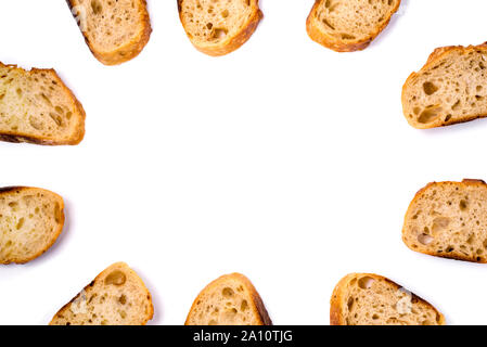 Frame of pieces of white bread isolated on white background. Stock Photo