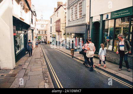 East Gate Tudor arch and clock tower in the High Street of Totnes, Devon, England, United Kingdom. Stock Photo