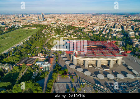 Milan cityscape and the soccer arena Meazza stadium, also known as San Siro Stadium. Aerial panoramic view. Stock Photo