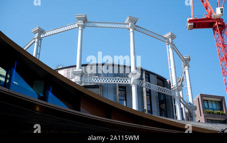 Gasholders building: block of flats, built inside disused historic Victorian gas holder in King's Cross, London UK. Photographed from Coal Drops Yard. Stock Photo