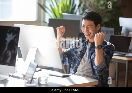 Young college student using computer Stock Photo