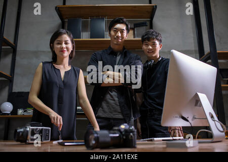 Photographers in studio Stock Photo