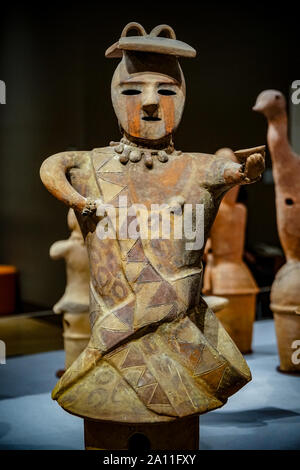 Haniwa (terracotta tomb figurine) woman with a painted face