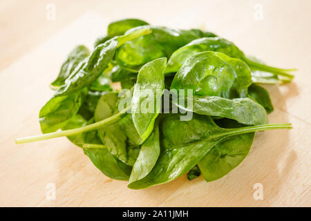 Spinach leaves in a bowl Stock Photo
