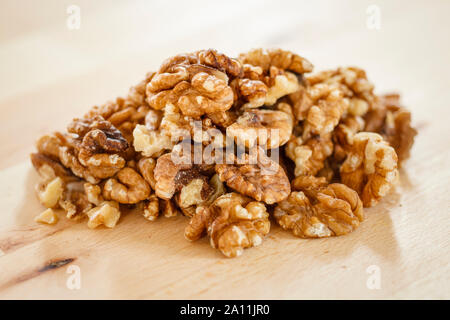 Walnuts close up, shelled, pile Stock Photo