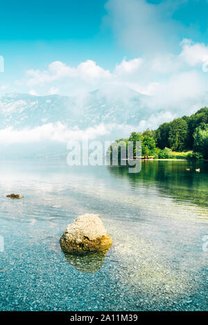 Lake Bohinj in Slovenia, beautiful scenic summer landscape of famous travel destination in Triglav national park in Alpine mountain range
