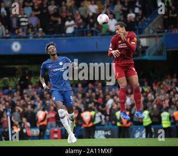 LONDON, ENGLAND - SEPTEMBER 22: Chelsea’s Tammy Abraham and Virgil Van Dijk on the ball during  the Premier League match between Chelsea FC and Liverpool FC at Stamford Bridge on September 22, 2019 in London, United Kingdom. (Hugo Philpott/MB Media) Stock Photo