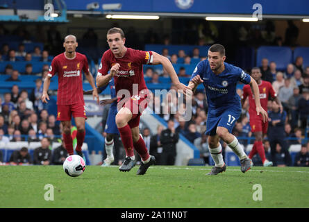 LONDON, ENGLAND - SEPTEMBER 22: Liverpool’s Jordan Henderson (L) and Chelsea’s Mateo Kovacic during  the Premier League match between Chelsea FC and Liverpool FC at Stamford Bridge on September 22, 2019 in London, United Kingdom. (Hugo Philpott/MB Media) Stock Photo