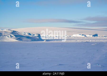 Antarctic Landscape of trapped icebergs in the Sea Ice. Snow Hill Island, Weddell Sea, Antarctica. Stock Photo