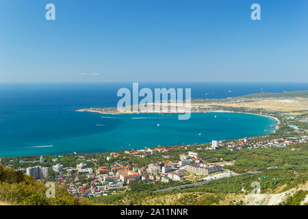 Aerial view of Gelendzhik city and sea bay. Photo of popular resort from hill of caucasian mountains.