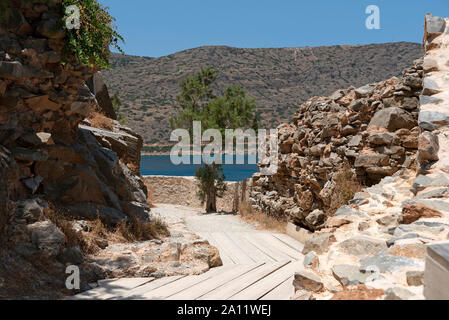 Spinalonga island, Crete, Greece.  Fortifications and venetian battlements on the former Leper Colony, Spinalonga situated in the Gulf of Mirabella. Stock Photo
