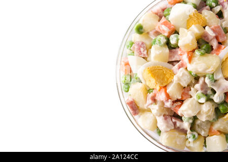 Traditional Russian salad in bowl. Olivier salad isolated on white background. Top view. Copy space Stock Photo