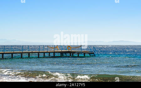 platform with orange lifeline in the Red Sea in Egypt Dahab Stock Photo