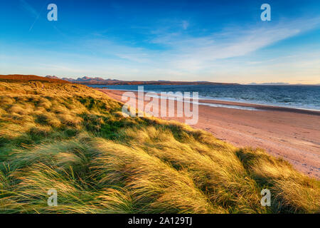 Sand dunes on a windy day Big Sand Beach at Gairloch in the Highlands of Scotland Stock Photo