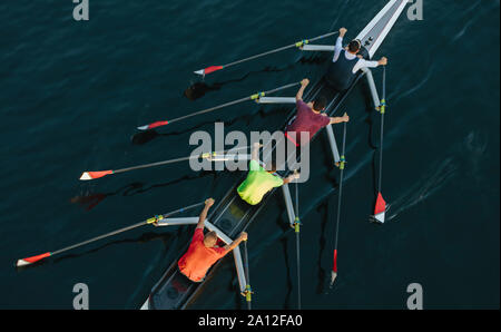 High angle view of unrecognizable male crew racers, Lake Union, Seattle, Washington Stock Photo