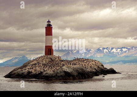 Les Eclaireurs Light House on rocky island on the Beagle Channel, Ushuaia, Argentina Stock Photo