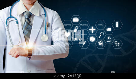 woman doctor holding hand up and using smart watch with futuristic holographic medical screen Stock Photo